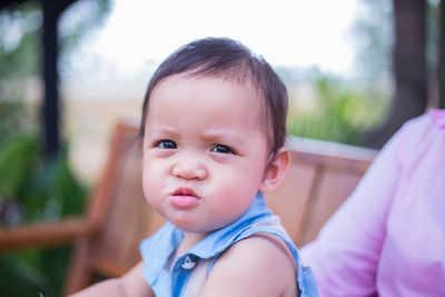 Portrait of cute baby looking away