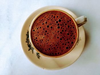 High angle view of coffee cup on table