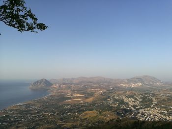 Aerial view of cityscape against clear sky