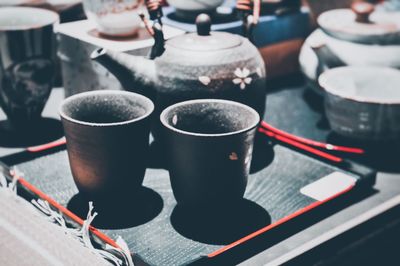 Close-up of coffee cup on table