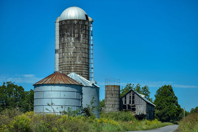 Low angle view of water tower against sky