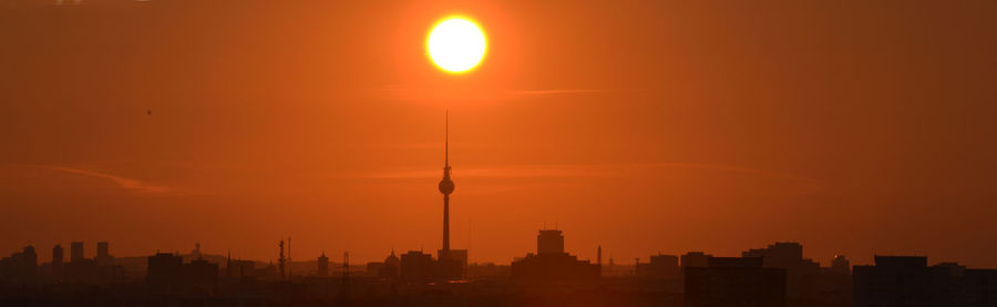 Silhouette of buildings at sunset