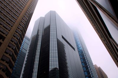 Low angle view of modern buildings against clear sky