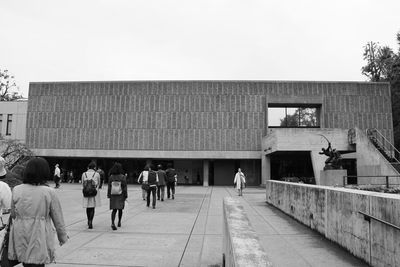 People in front of building