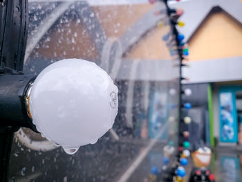 Close-up of raindrops on glass window