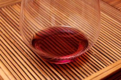 High angle view of wine in on textured tray