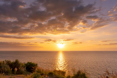 Scenic view of sea against sky during sunset