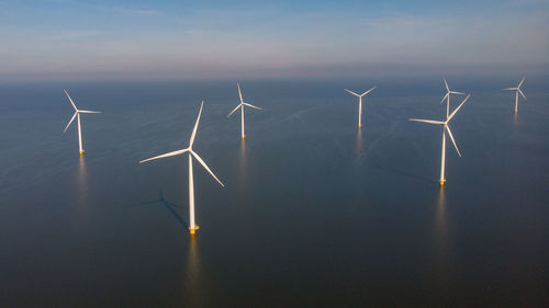 Windmill against clear sky