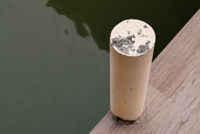 High angle view of cigarette on table