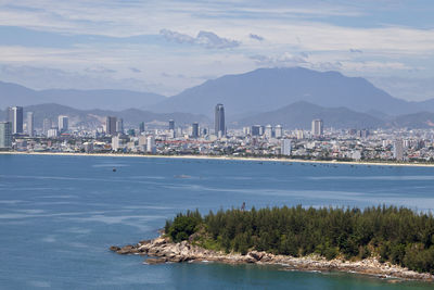 Sea and buildings in city