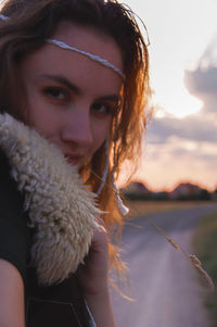 Portrait of beautiful young woman in water