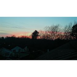 Built structure against sky at sunset