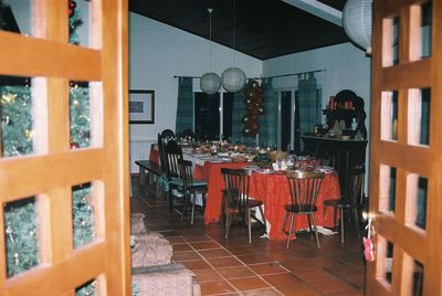 Empty chairs and tables in restaurant