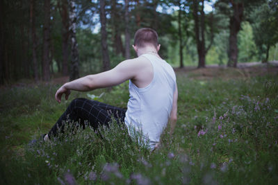 Rear view of man on field