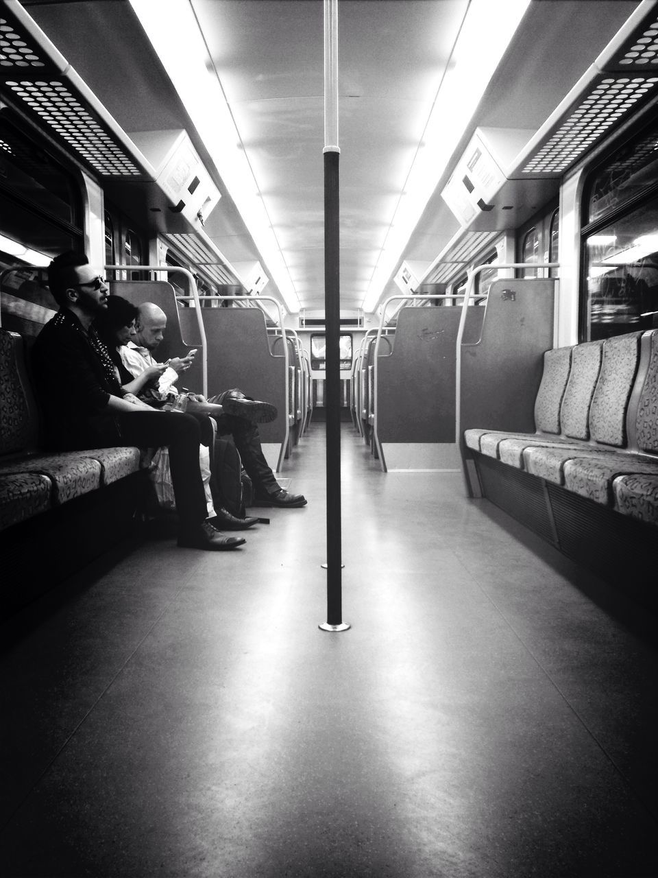 indoors, ceiling, flooring, built structure, architecture, transportation, public transportation, empty, illuminated, interior, rail transportation, railroad station, subway station, reflection, incidental people, subway, absence, tiled floor, railroad station platform, corridor