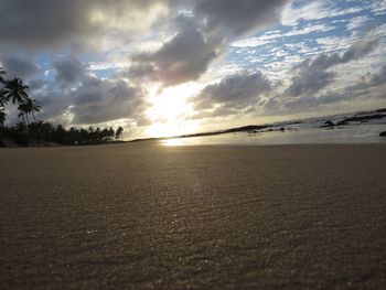 Scenic view of beach against sky during sunset