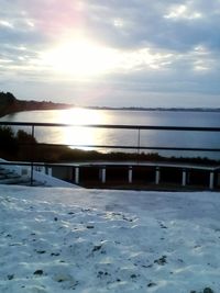 Scenic view of sea against sky during winter