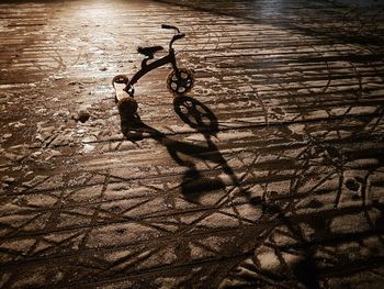 High angle view of shadow on sand