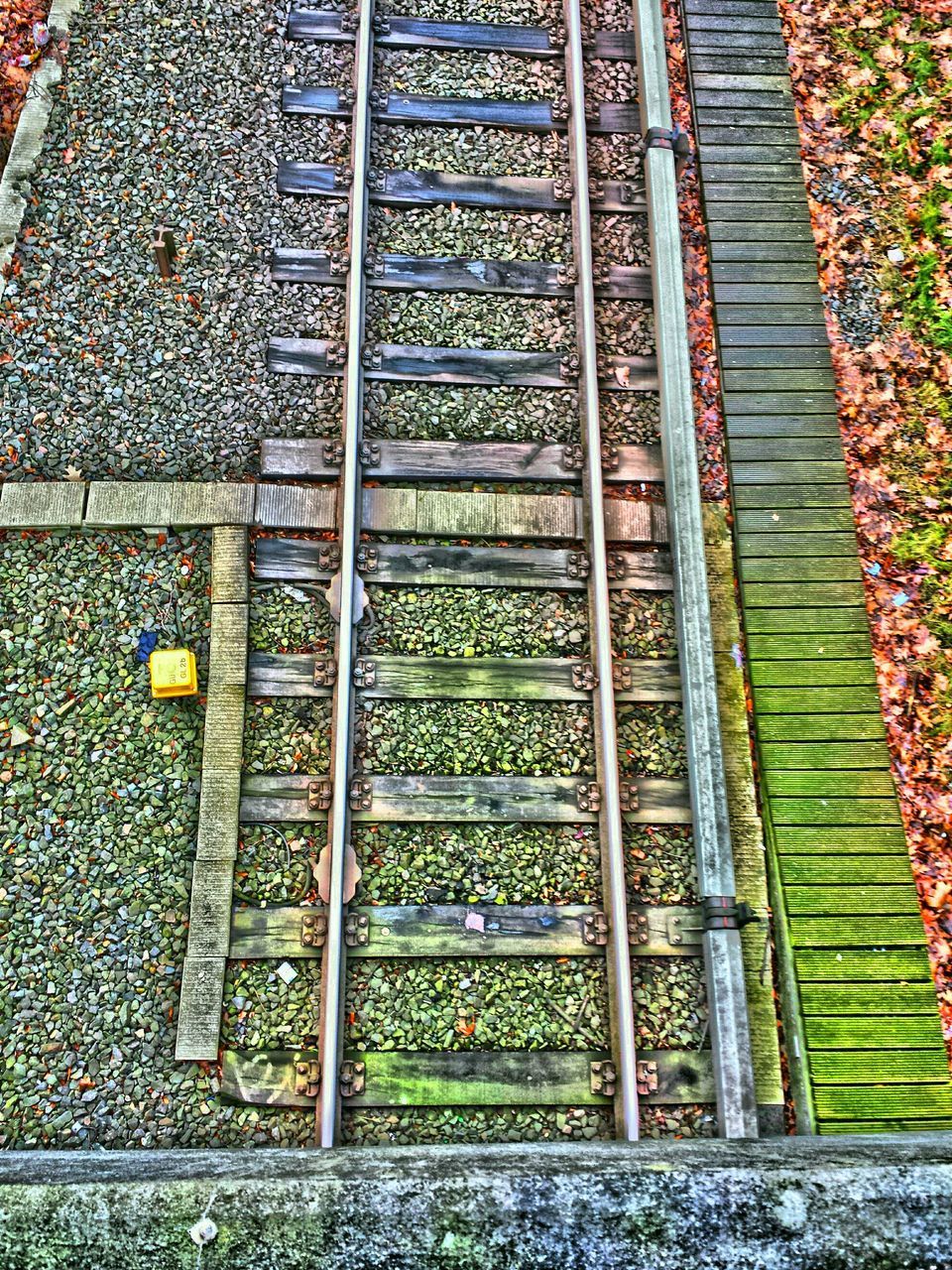 high angle view, pattern, abundance, metal, outdoors, repetition, day, in a row, no people, wood - material, steps, full frame, metallic, large group of objects, backgrounds, railing, order, fence, side by side, arrangement