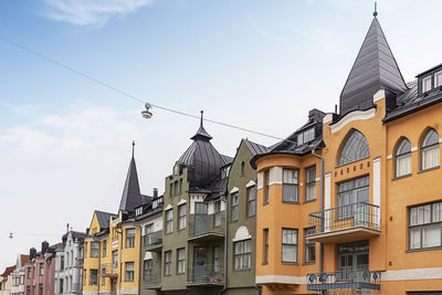 Low angle view of church against sky in city