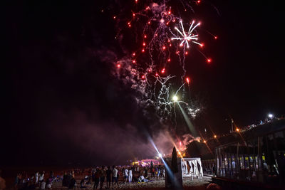 Firework display at night