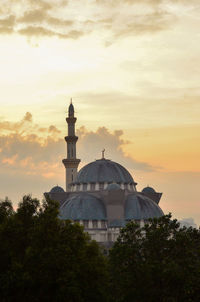 View of bell tower against sky during sunset