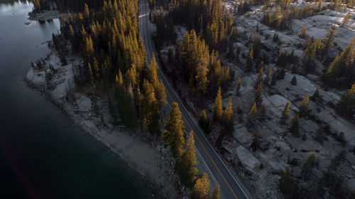 High angle view of road by lake in city