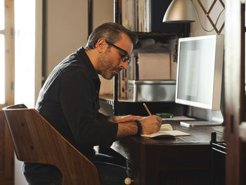 Man working on table