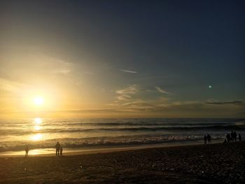 Scenic view of beach during sunset