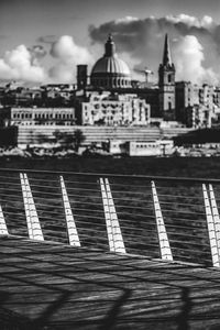 View of buildings against cloudy sky