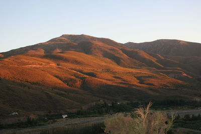 Scenic view of mountains against clear sky