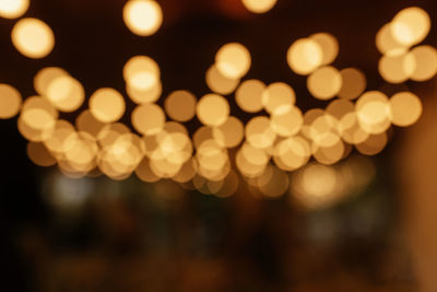 Defocused image of illuminated lights at night