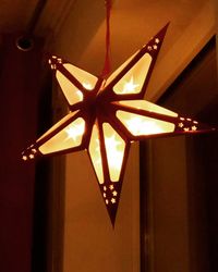 Low angle view of illuminated ceiling