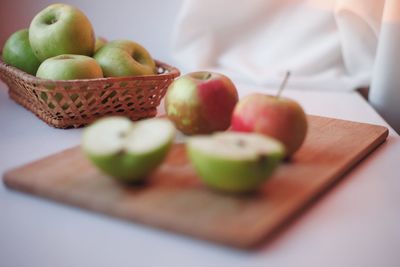 Close-up of apples on cutting board