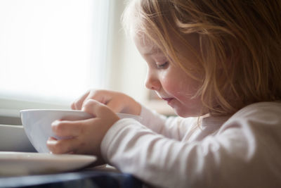 Close-up of girl making face