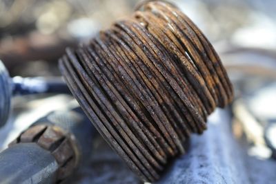 Close-up of rusty metal on table