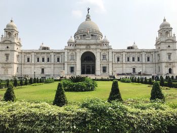 View of historical building in garden