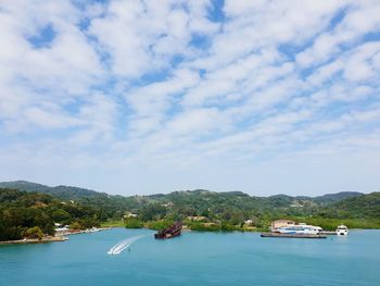 Scenic view of bay against sky