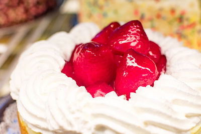 Close-up of strawberry on cake
