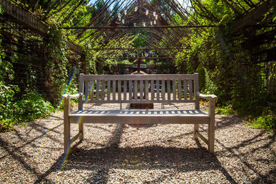 Empty bench in park