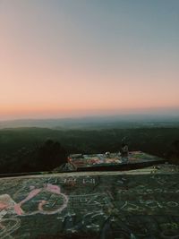 High angle view of townscape against sky at sunset