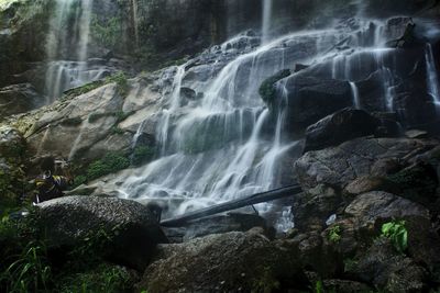 Scenic view of waterfall in forest