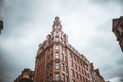 Low angle view of old building against sky