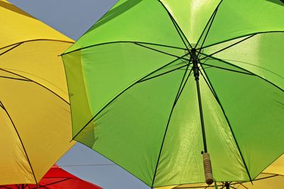 Colorful umbrellas from low angle view