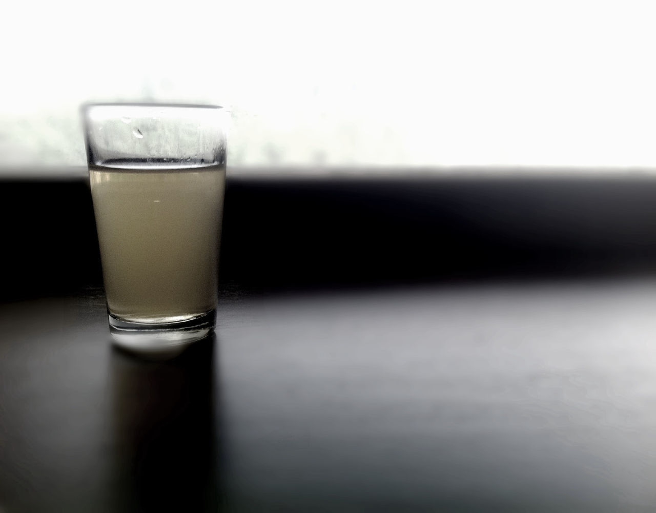 drink, indoors, food and drink, refreshment, close-up, table, still life, freshness, drinking glass, glass - material, focus on foreground, selective focus, glass, transparent, alcohol, no people, single object, frothy drink, bottle, liquid