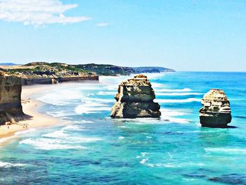 Scenic view of sea against blue sky