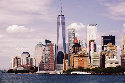 Modern buildings in city against sky