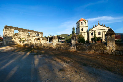 View of old building against blue sky