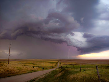 Lighting strike over a rural dirt road