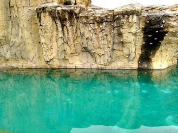 Close-up of swimming pool against sea